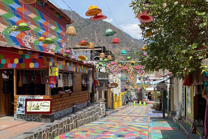 Authentic tour of Mayan art and culture in Lake Atitlan - Stop 2: San Pedro La Laguna Spanish Learning, Market Snacks, and San Pedro Apostol
