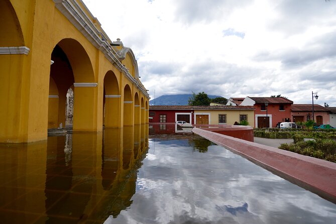 Discover Antigua Tour from Puerto Quetzal with Lunch - Nim Po’t Centro de Textiles Tradicionales: Souvenirs With a Purpose