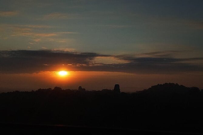 From Flowers Sunrise in Tikal and Sunset in Yaxha in a day - Temple V and the End of Tikal: The Best-Preserved Feeling
