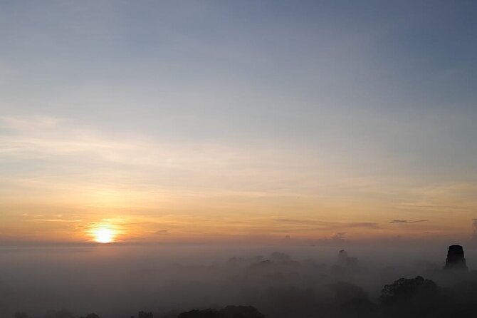 From Flowers Sunrise in Tikal and Sunset in Yaxha in a day - The Midday Break: Las Gardenias, El Remate, and the Timing Gap