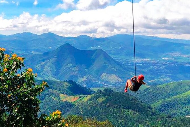 Hobbitenango, Altamira and Antigua Borial parks. - Swing, Archery, and the Colosal Hand Photo Stops