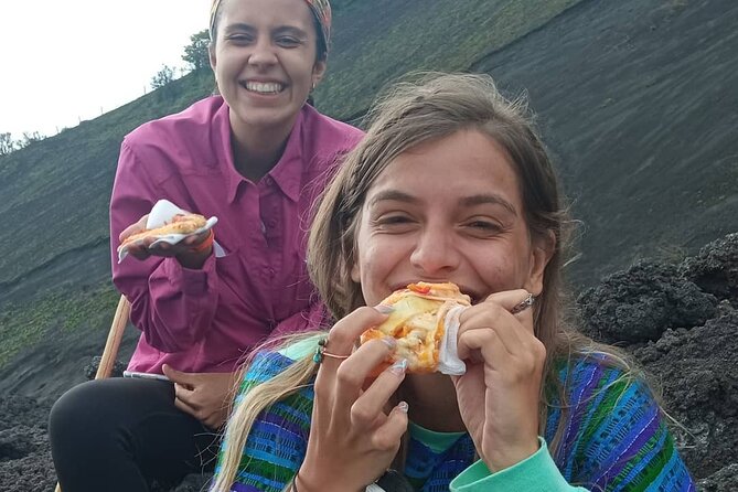 Pacaya Volcano Vistas + Enjoy Pizza Surrounded by The Volcano - The pizza cooking show: volcanic rocks, charcoal, and portion expectations