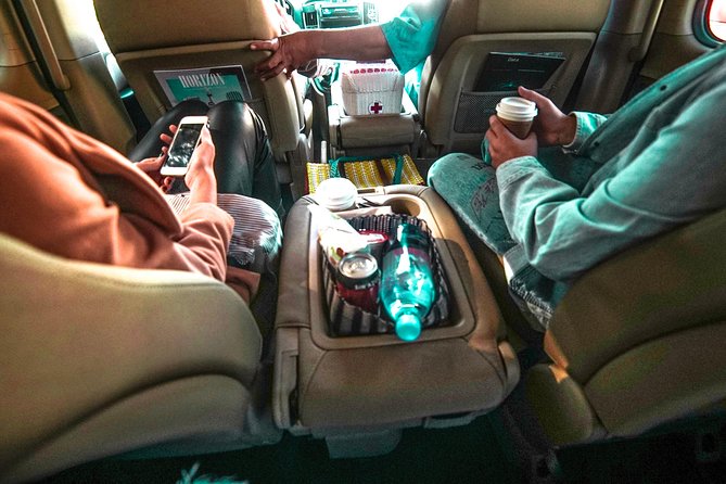 Private Transportation Service in Guatemala on a Minibus with A/C - Pickup in Guatemala City: hotel or airport, with a sign